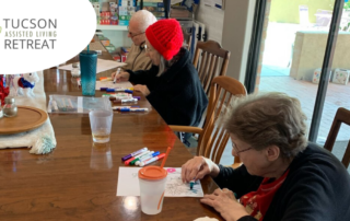 Residents enjoy coloring as a part, an activity that can be useful in memory care.