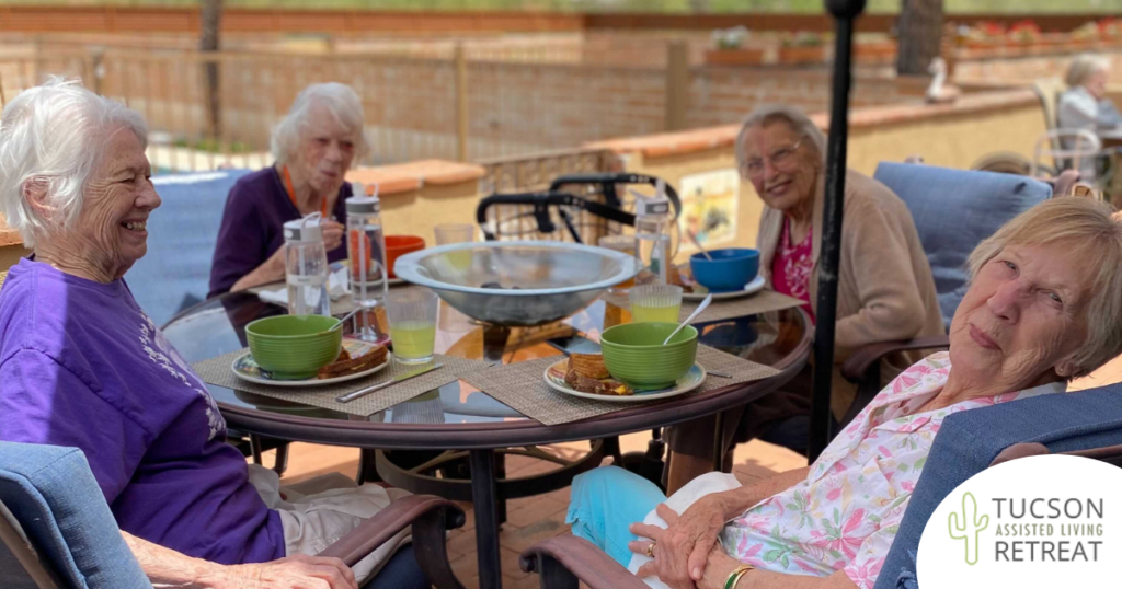 Several older adults enjoy quality senior nutrition together at our assisted living facility.