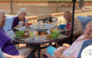 Several older adults enjoy quality senior nutrition together at our assisted living facility.