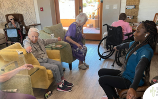 Taking time to move and stretch, like this group of residents and our CarePartner in our facility is, can help those with arthritis.